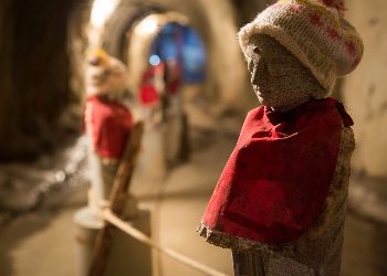 Little statues in the cave behind the temple